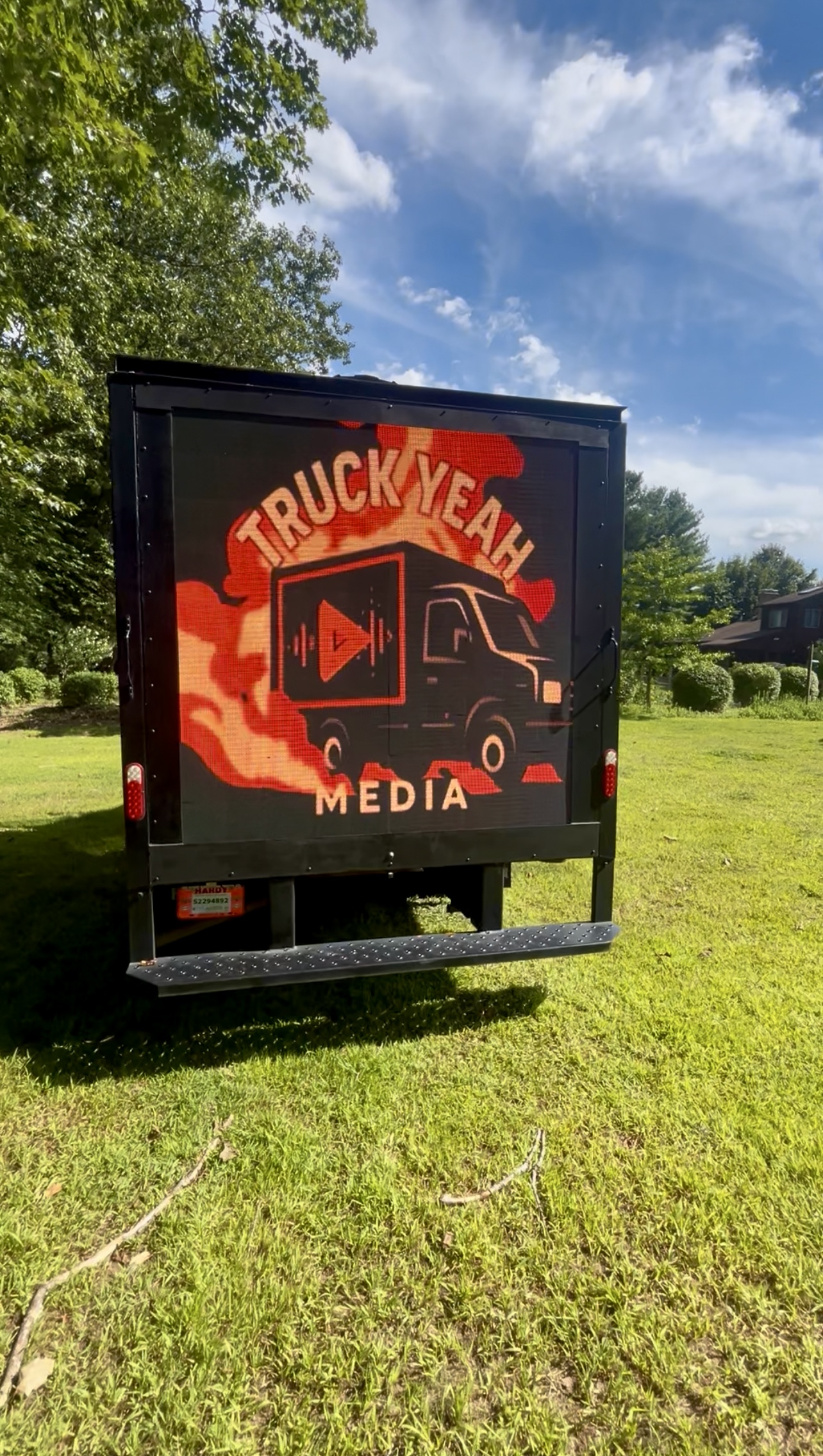 LED truck advertising on city street